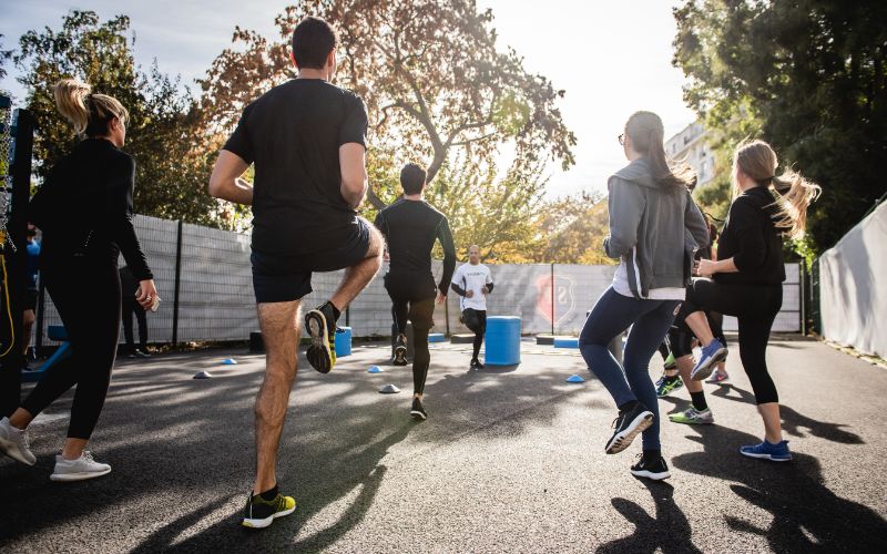 group of people exercising regularly